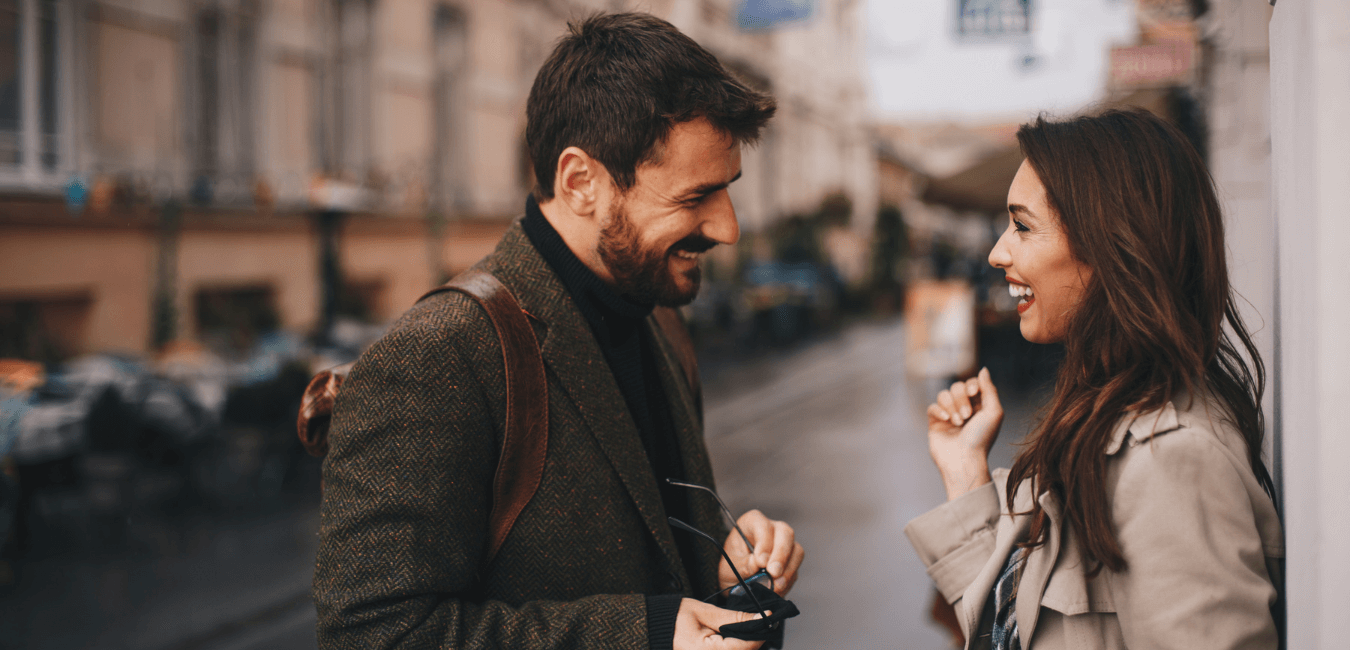 Couple laughing at outdoors